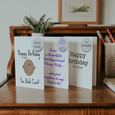 Cunt cards with a detachable badge included for an extra laugh