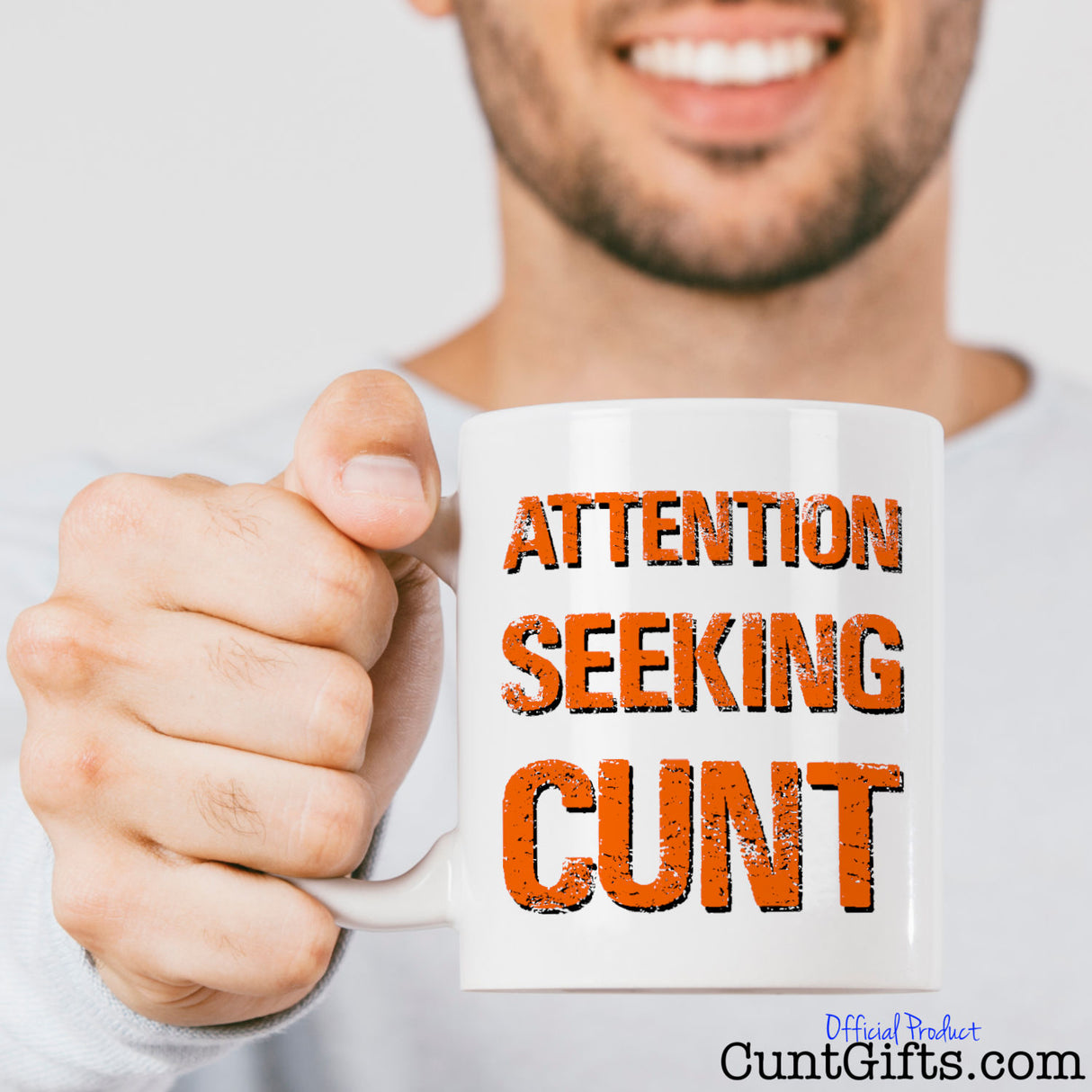Attention Seeking Cunt Mug - Held by man with beard.