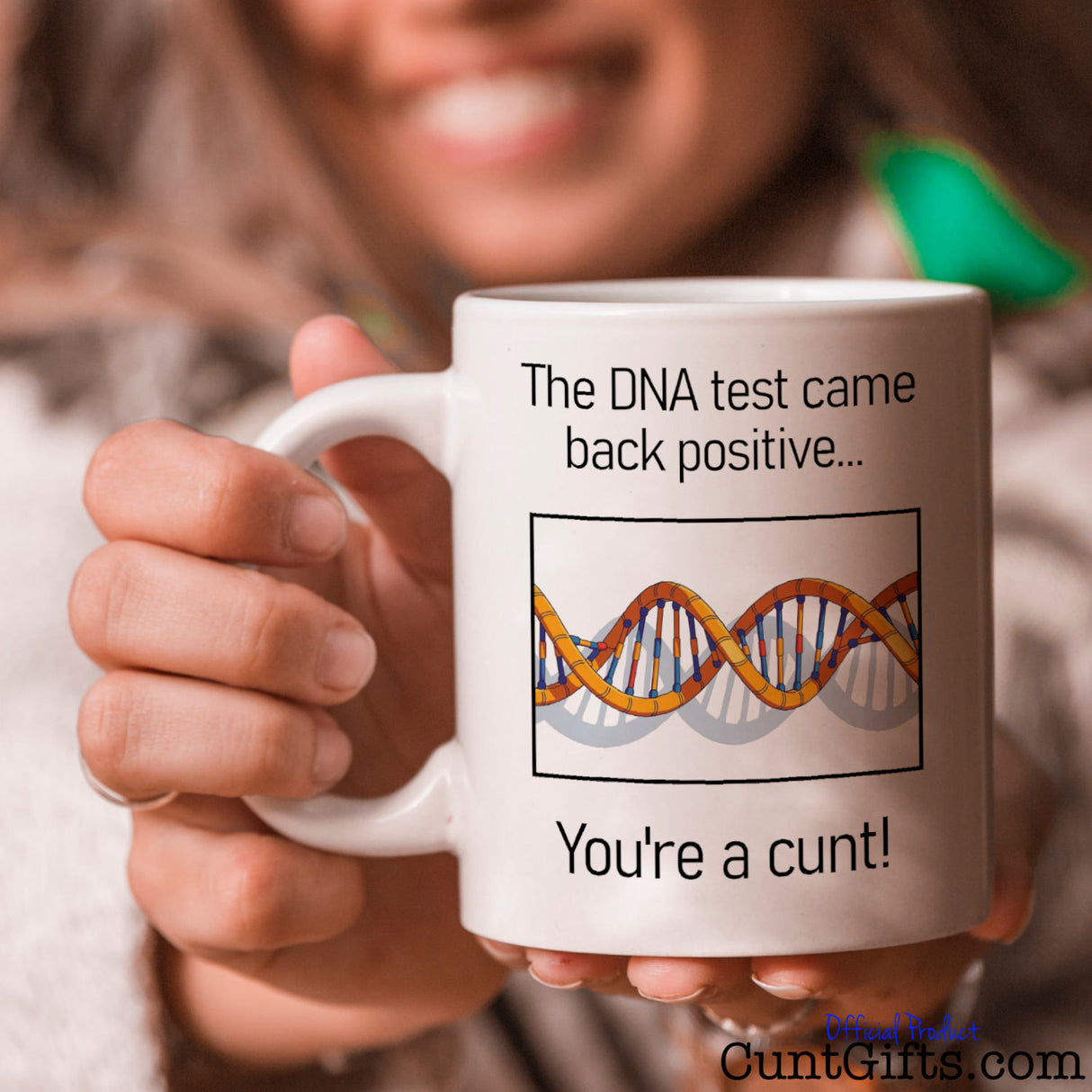 "The DNA Test - You're a cunt" - Mug held by smiling woman