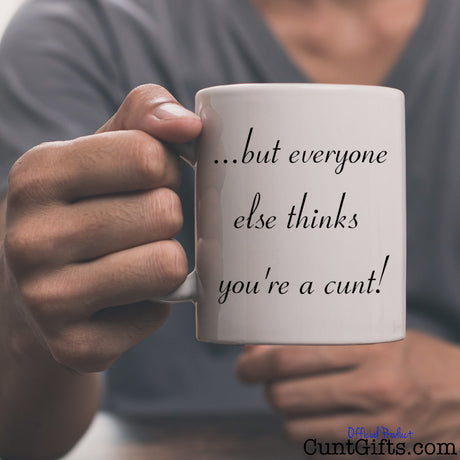 Jesus Loves You Cunt Personalised Mug - Back Side held by man in grey t-shirt