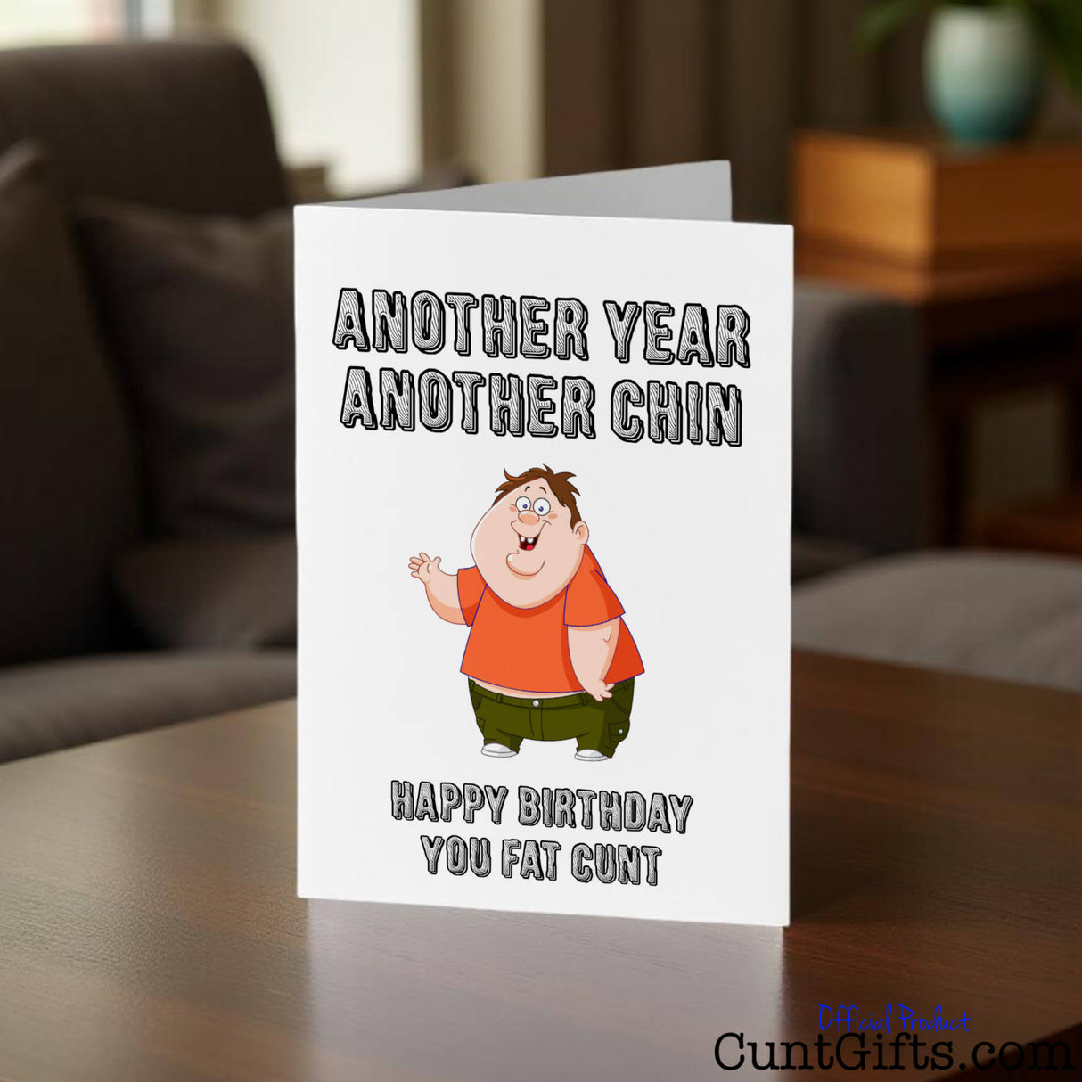 Another Year Another Chin You Fat Cunt Birthday card on a table.