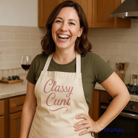 Classy Cunt Apron worn by laughing woman in kitchen.
