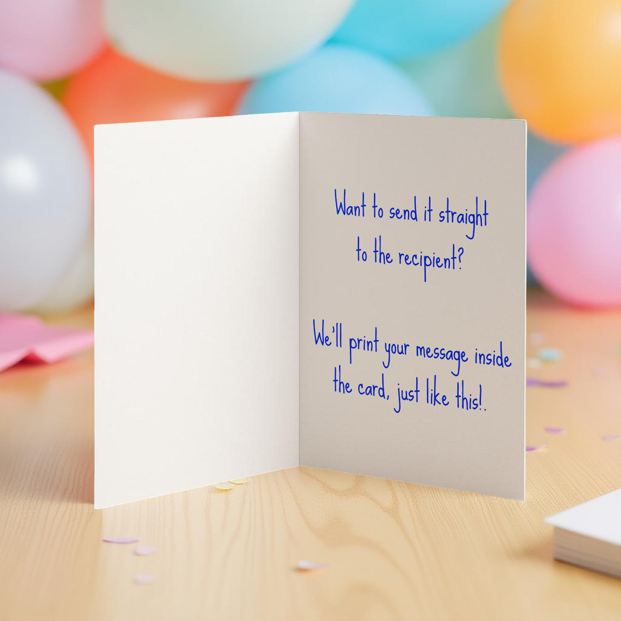 Cunt birthday card opened showing a personalised message inside with blue writing with balloons in background