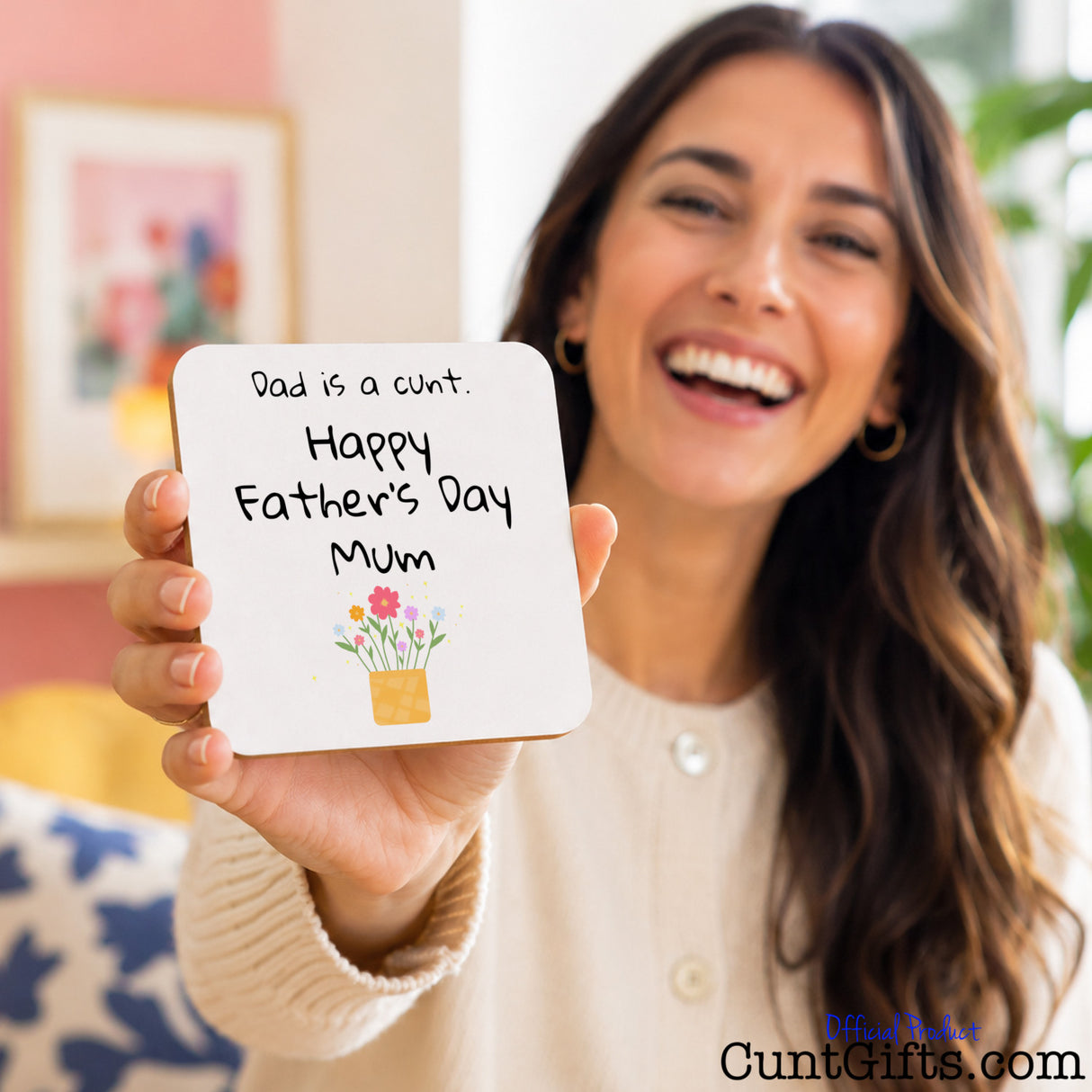 Dad is a cunt - Happy Father's Day Mum - Drink coaster held by smiling brunette woman.