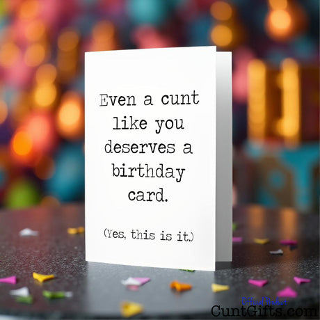 Even a cunt like you birthday card on a colourful party background