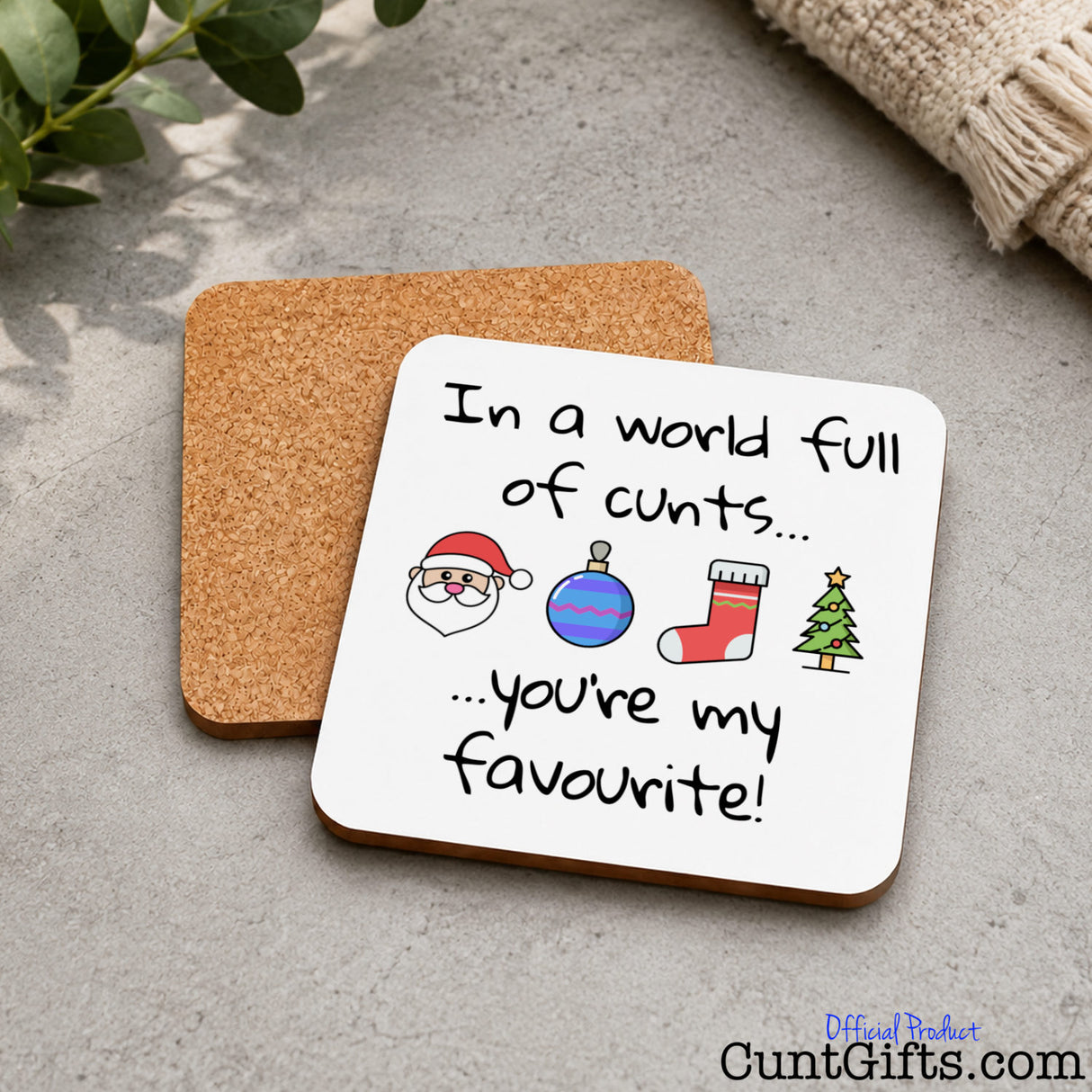 In A World Full Of Cunts You're My Favourite - Christmas Drink Coaster showing both sides by rug.