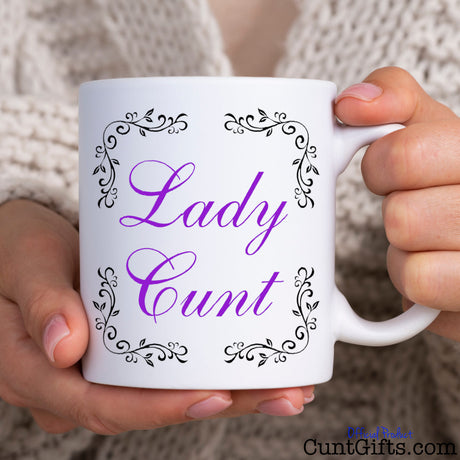 Lady Cunt Mug held by woman in knitted jumper