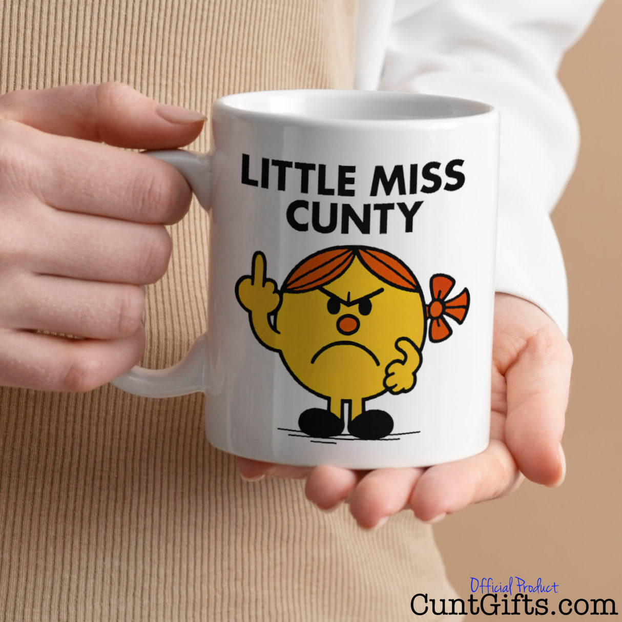 Little Miss Cunty Mug held by woman in beige jumper