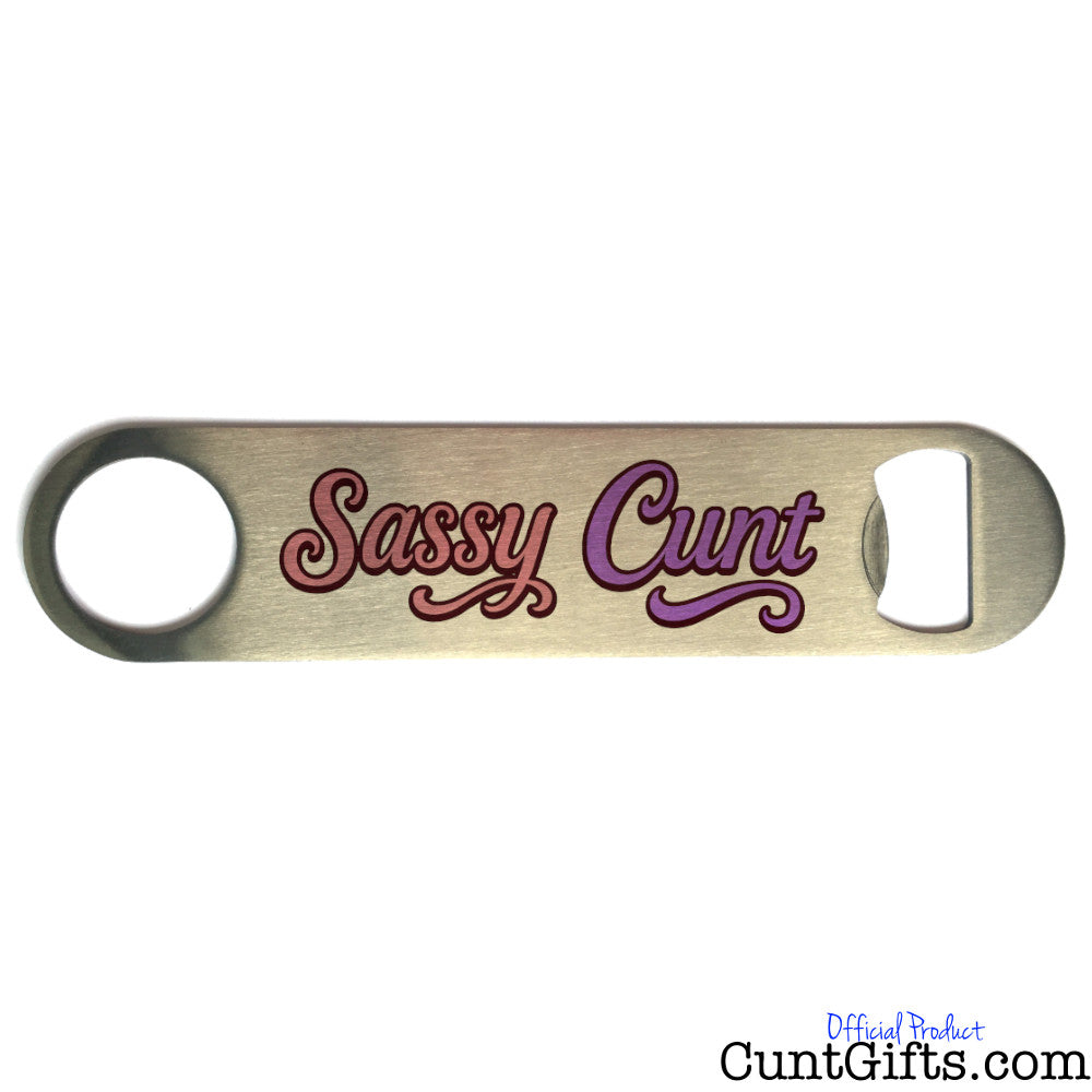Metal bottle opener with 'Sassy Cunt' text on a white background