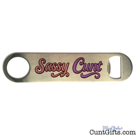 Metal bottle opener with 'Sassy Cunt' text on a white background