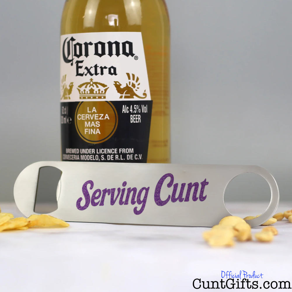 Corona Extra beer bottle with a  'Serving Cunt' bottle opener.