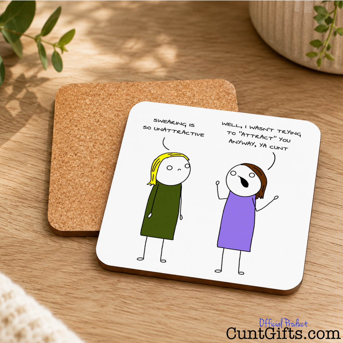 A square white coaster with rounded corners featuring a cartoon illustration of two girls and a humorous caption funny cartoon drawing saying "I wasn't trying to attract you cunt"in handwritten text.