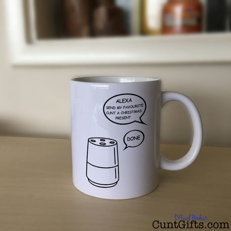 Alexa Cunt Christmas Mug on Sideboard