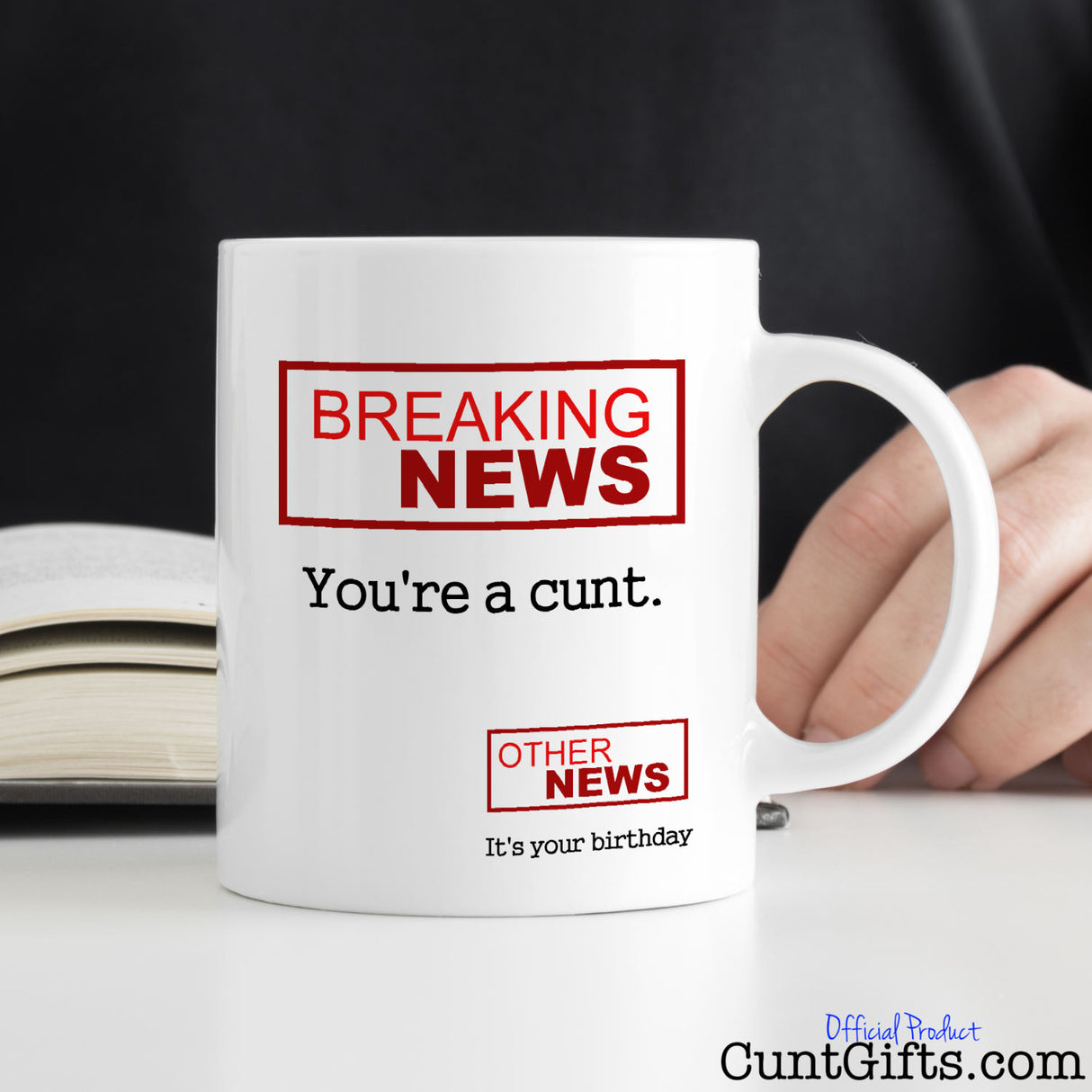 Breaking News You're a Cunt - Birthday mug on desk with man reading