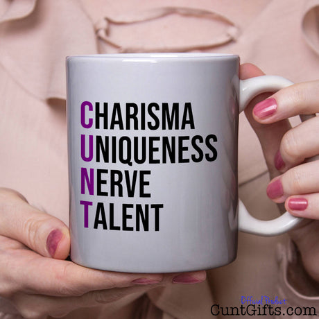 Charisma Uniqueness Nerve and Talent Purple - Mug held by woman in pink blouse