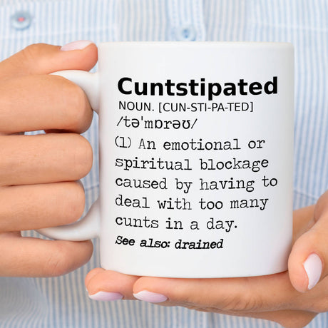 Cuntstipated - Mug held by woman in small striped shirt