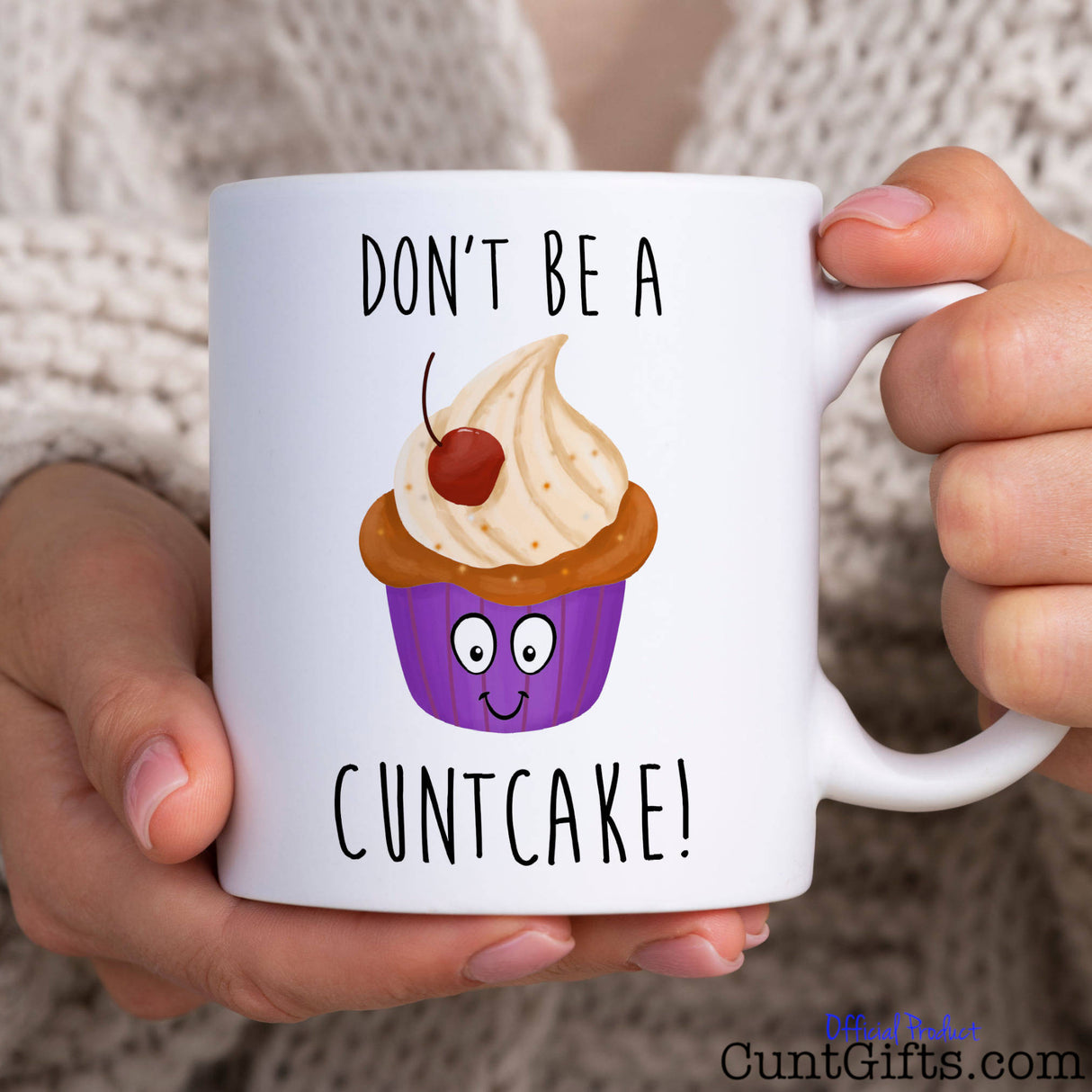 Don't be a Cuntcake - Mug held by woman in knitted jumper