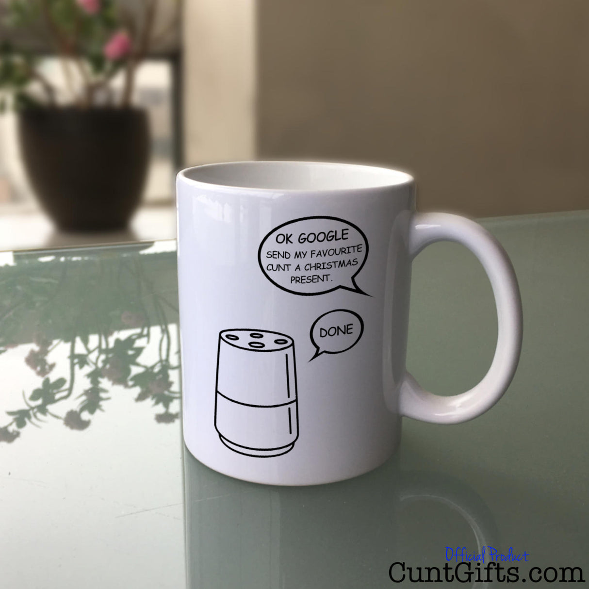 Google Cunt Christmas Mug on Glass Table