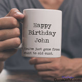 Happy Birthday ANY NAME Old Cunt - Mug with man in tee shirt