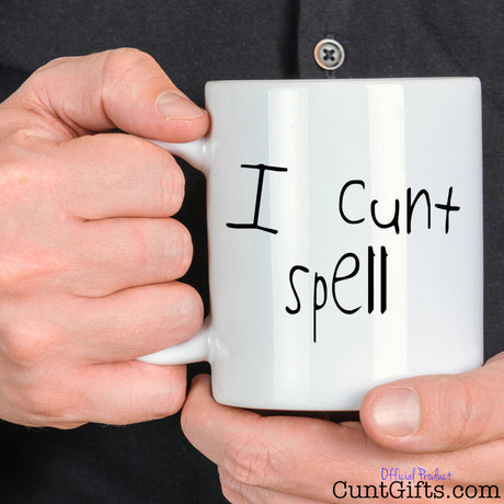I Cunt Spell - Mug held by man in black shirt