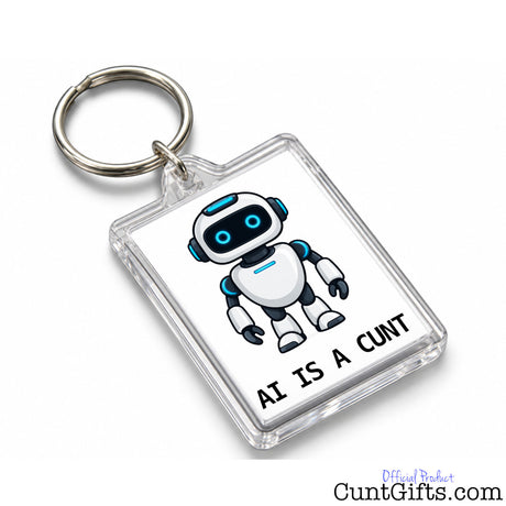 Transparent rectangular AI Is a Cunt keyring with metal split ring, featuring a blue-eyed robot and bold black lettering.