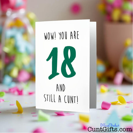 Card with text 'WOW! YOU ARE 18 AND STILL A CUNT!' on a colourful confetti background.