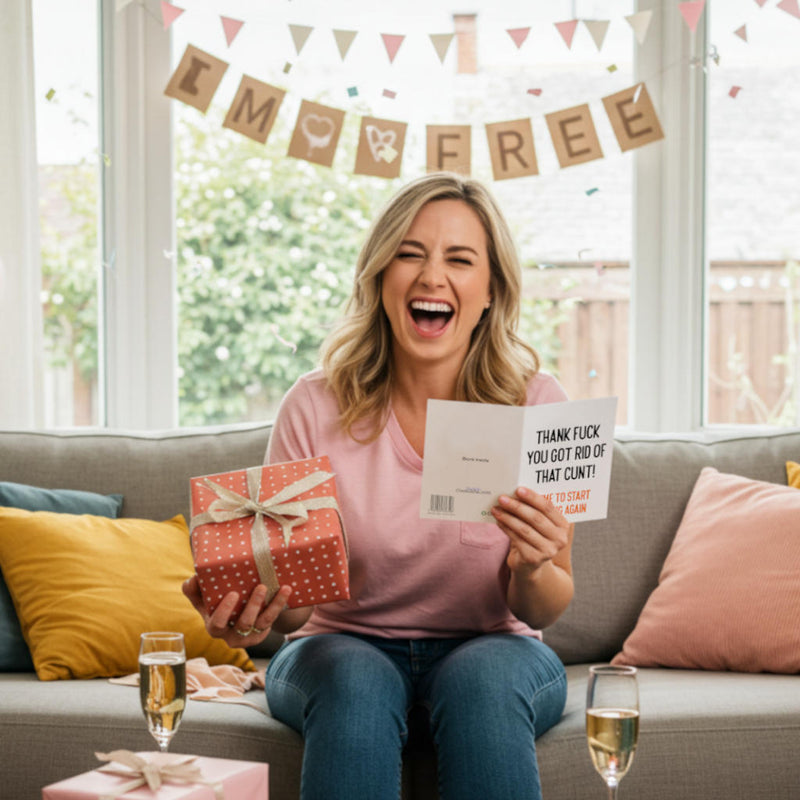 Breakup and divorce cards and gifts featuring the word cunt. A woman sitting on a couch with a gift and a card, surrounded by confetti and 'I'm Free' banner.
