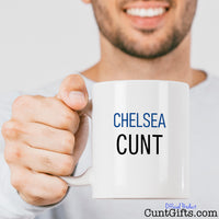 Chelsea Cunt Mug held out by man with beard