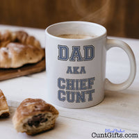 Chief Cunt Dad Mug with coffee and croissants