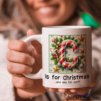 C is for Christmas and also for cunt - Mug held by smiling woman