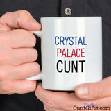 Crystal Palace Cunt Mug held by man in black shirt