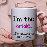 I'm the bride - I'm allowed to be a cunt - Mug held by woman in pink blouse