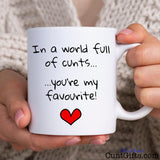 In a world full of cunts you're my favourite - Mug held by woman