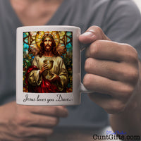 Jesus Loves You Cunt Personalised Mug - Front Side held by man in grey t-shirt