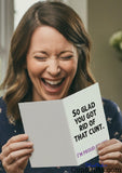 So glad you got rid of that cunt - Breakup Divorce Card held by laughing woman