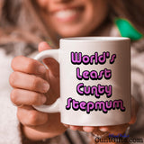 World's Least Cunty Stepmum - Mug held by smiling woman