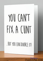 You can't fix a cunt but you can divorce it - Breakup Card on wooden shelf