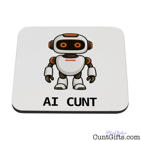 Square white AI Cunt drink coaster featuring a cheeky orange-eyed cartoon robot and bold black AI CUNT lettering.