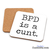 BPD is a cunt drinks coaster showing both sides.