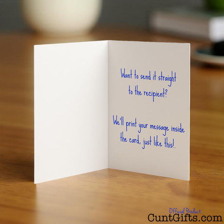 Cunt card opened showing a personalised message inside with blue writing.