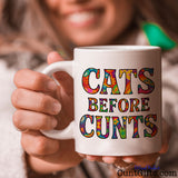 Cats Before Cunts - Mug held by smiling woman