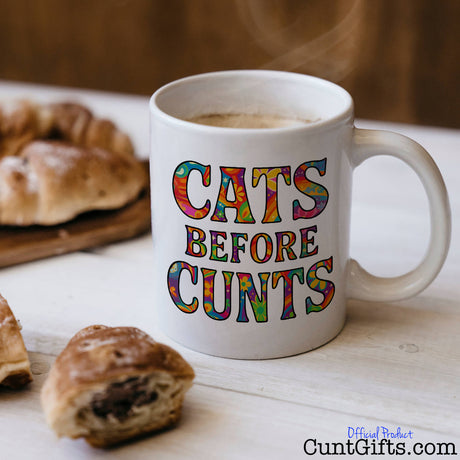 Cats Before Cunts - Mug on table with pastries
