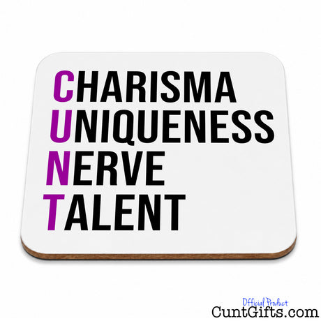 A square white drinks coaster with rounded corners, featuring the text 'CHARISMA UNIQUENESS NERVE TALENT' in bold black letters, with the first letters of each word highlighted in purple, spelling CUNT in the other direction.