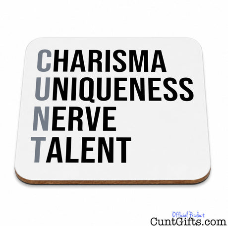 A square white subtle cunt drinks coaster with rounded corners and a thin brown wood edge, printed with the words 'CHARISMA UNIQUENESS NERVE TALENT'.