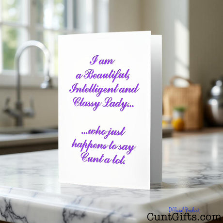 Classy Lady Who Says Cunt Card written in purple text on a kitchen counter
