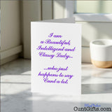 Classy Lady Who Says Cunt Card on a white surface with a blurred background.