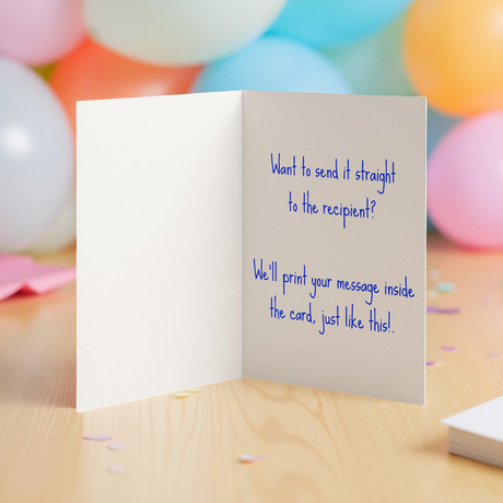 Cunt birthday card opened showing a personalised message inside with blue writing with balloons in background