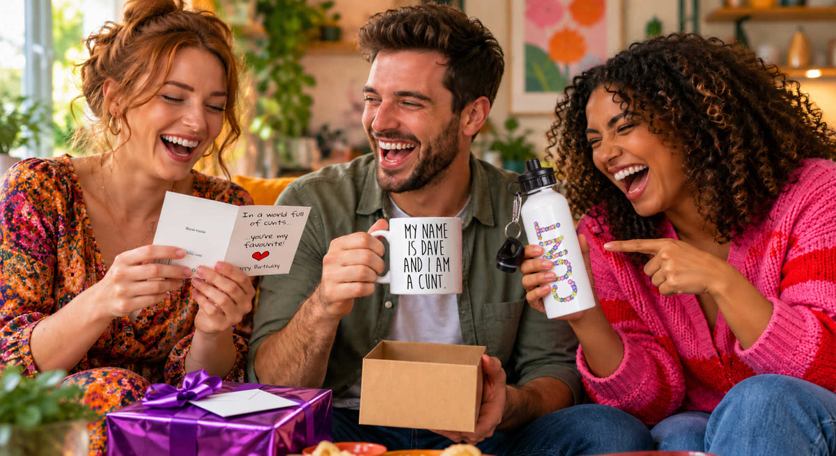 Three friends laughing with funny cunt gifts including a cunt mug, card and water bottle.
