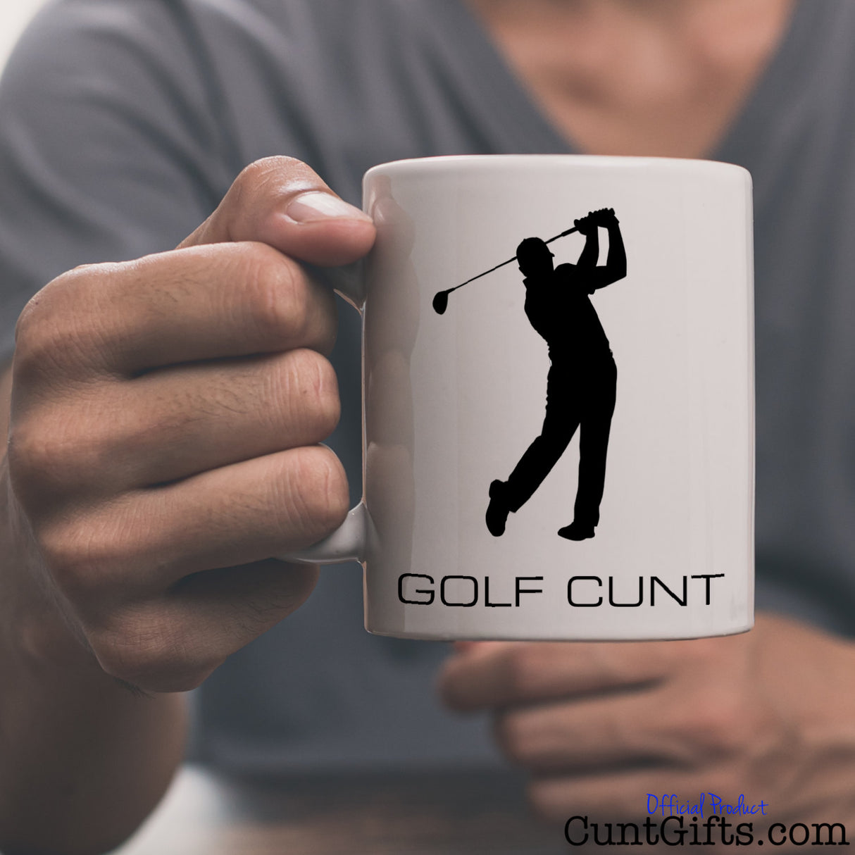 Golf Cunt Mug held by man in grey V-neck tee shirt