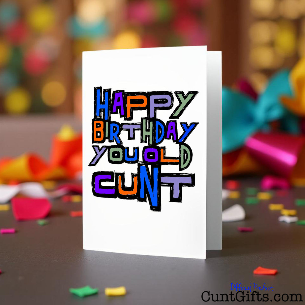 Old Cunt birthday card on a blurred background of party decorations